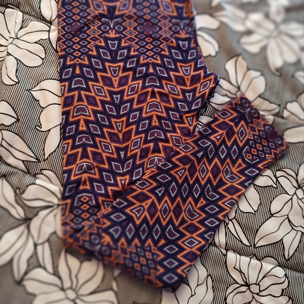LuLaRoe tall and curvy. New. Navy, peach, muavy purple and light green colors.